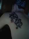 tribal wolf symbol for courage tattoo