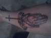 Cross tattoo