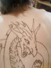 Dragons face tattoo
