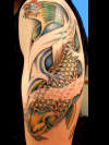 Koi Green tattoo