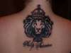 Lion with Crown tattoo