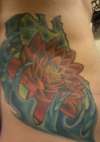 Red lotus flower tattoo