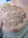 dragon chest piece tattoo