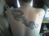 dragon now its repaired tattoo