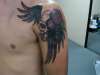 skull with wings tattoo