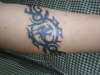 tribal dragon band tattoo