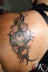 FLOWER WITH TRIBAL TATTOO BY JUSTIN KONTRA tattoo