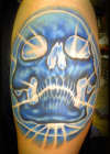 Skull cover up of old tattoo. done by Beto Munoz tattoo