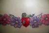 frog on flowers tattoo