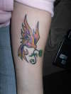 Bird with a flower tattoo