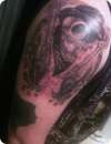 Cowboy Skull with Guns and Leaves tattoo