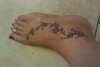 Flowers On Foot tattoo