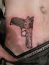 Gun tattoo