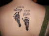 Kid's footprints tattoo
