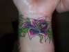 flower on the wrist tattoo