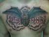 grenade with wings tattoo