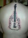 guitar brushed ink tattoo