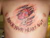 rock your heart out chest tat tattoo