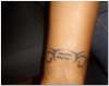 Aquarius symbol tattoo