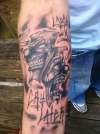 Custom Laugh Now/Cry Later Faces tattoo