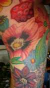 Latests addition to my sleeve.12/20/10 Dogwood flower, asters, tattoo