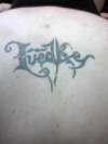 Tribal lastname (Luedke) tattoo