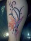 bird of paradise flower with tribal tattoo