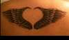birds wings tattoo