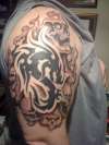 dragon and skulls tattoo