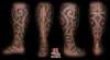 embossed stone tribal leg sleeve tattoo