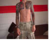 front view of body suit in progress tattoo