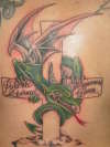 dragon on cross tattoo