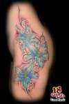 lillies and tribal tattoo