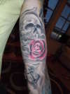 skull & pink rose tattoo