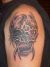 skull with horns tattoo