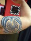 under left arm tattoo
