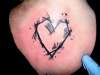 Scratch built heart tattoo