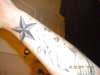 Star and dust tattoo