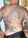 back in progress tattoo