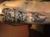 evil face tattoo