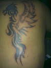 tribal dragon tattoo