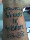 wounds to wisdom tattoo