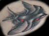 Red Swallow tattoo