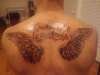 angel wings and destined 4 greatness tattoo