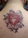 heart with name in it tattoo