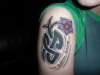 lymphoma flower rework on tribal tattoo