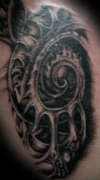 Bio mech chest tattoo