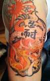 Close Up of Erics Dragon - Munch Art tattoo