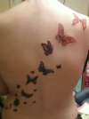 Flying butterflies tattoo