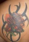 ROSE WITH TRIBAL tattoo